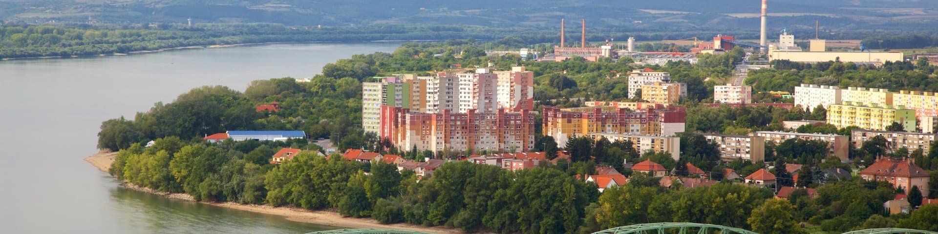 Esztergom which includes a bridge, a river or creek and industrial elements