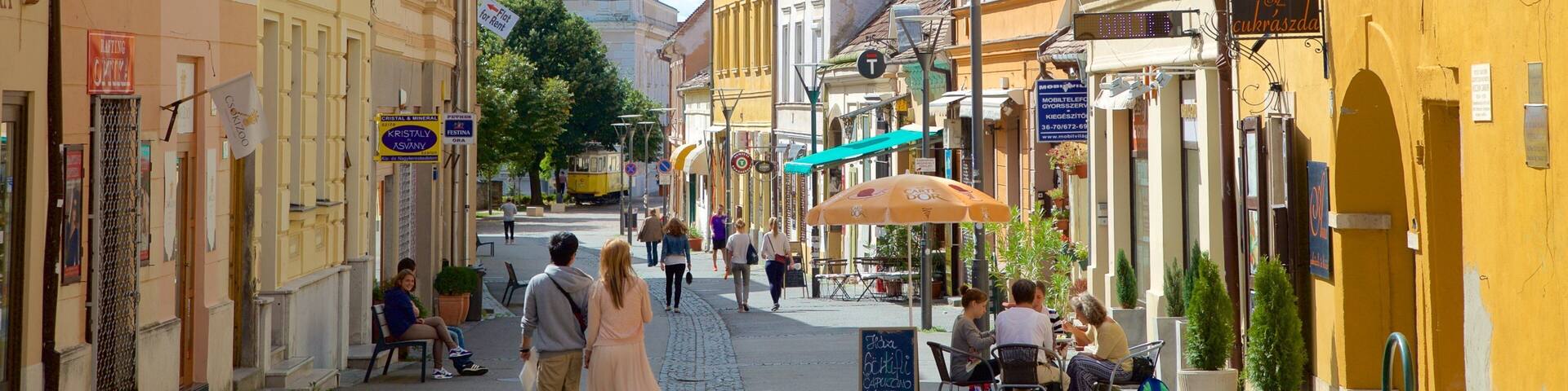 Pecs caracterizando cenas de cafeteria, elementos de patrimônio e cenas de rua