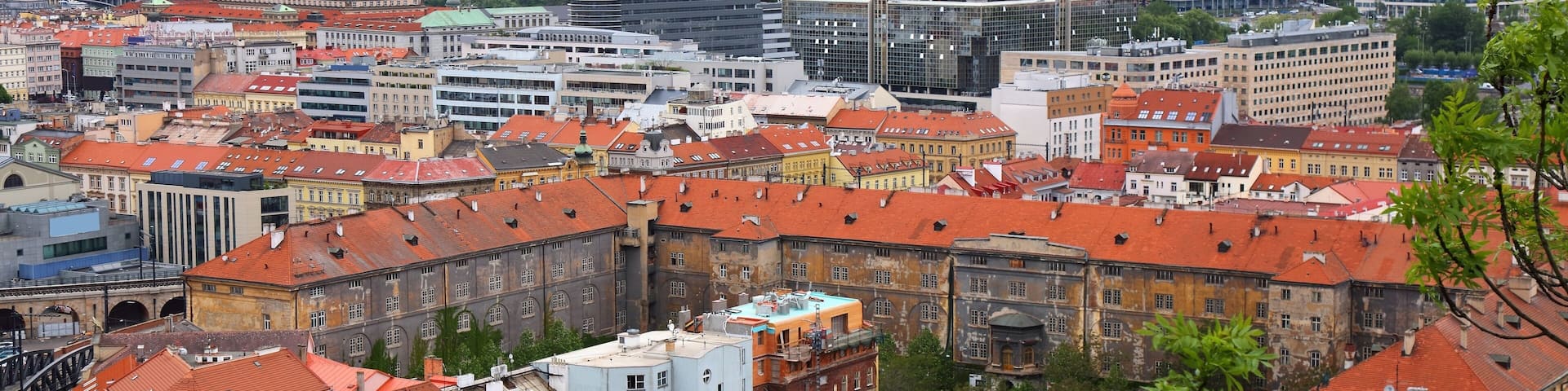 A cityscape with historic buildings and modern architecture.