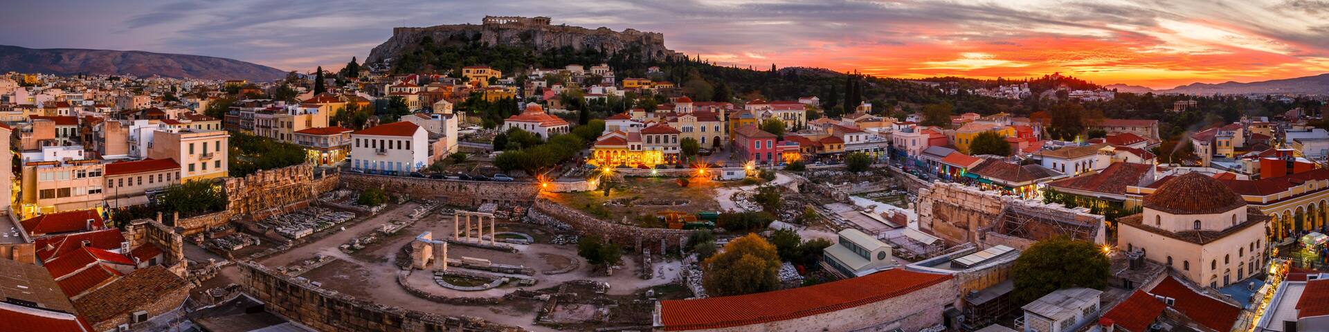 View of Acropolis from a roof top coctail bar at sunset, Greece.