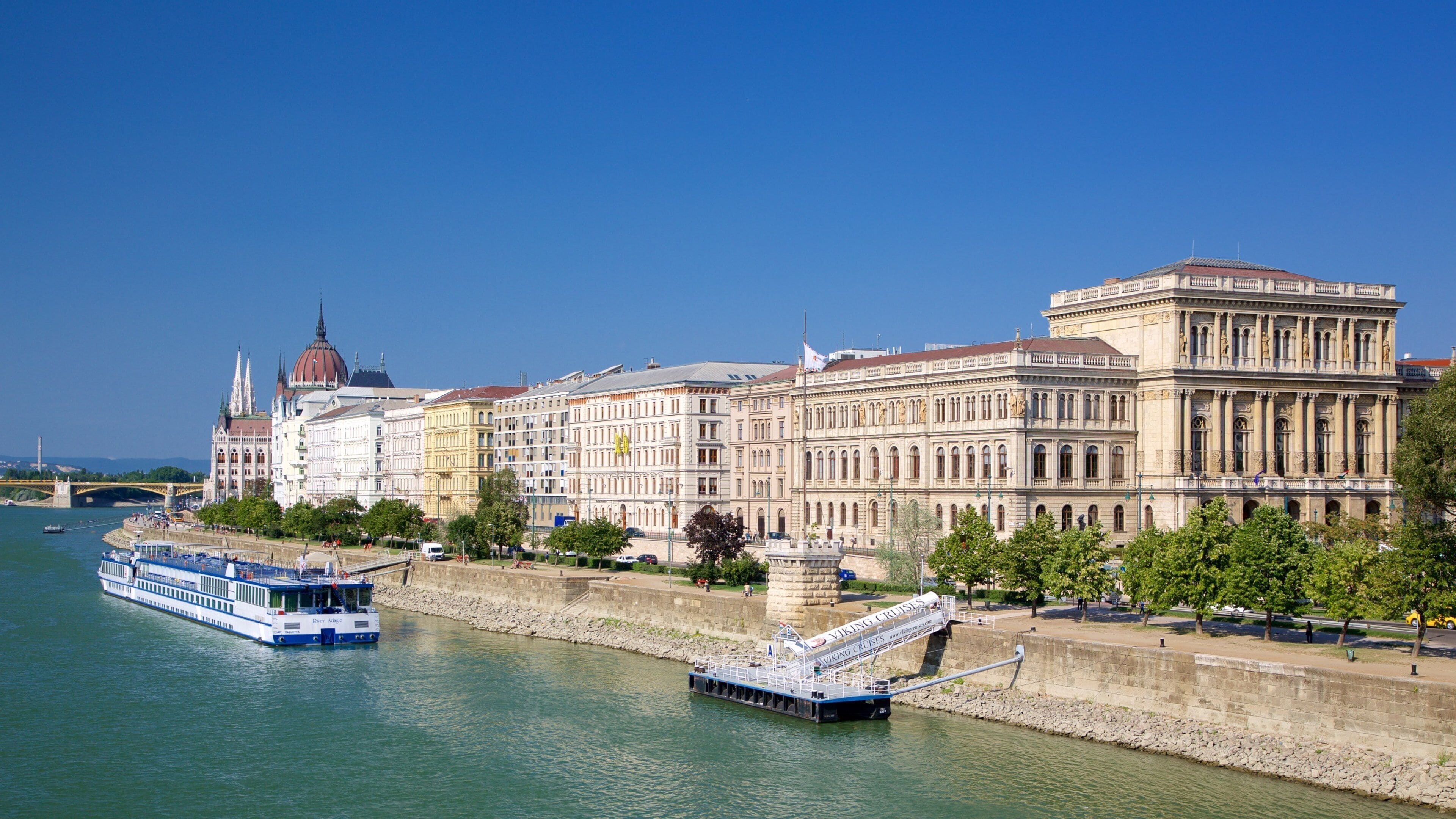 Budapest which includes a city, a ferry and a river or creek