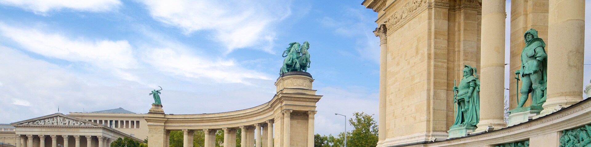 Andrassy showing a statue or sculpture, heritage elements and street scenes