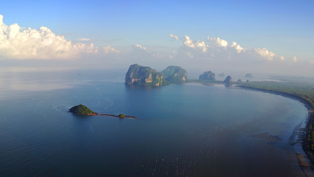 An unspoilt beach of Pak meng, Sikao District, Trang Province, Thailand. A natural beauty of crystal clear sea water, white sandy beach and distant islands located at Southern Thailand