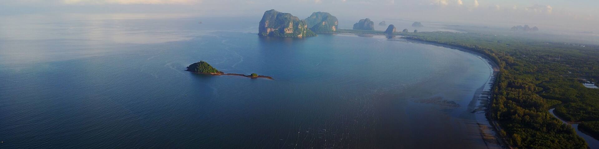 An unspoilt beach of Pak meng, Sikao District, Trang Province, Thailand. A natural beauty of crystal clear sea water, white sandy beach and distant islands located at Southern Thailand