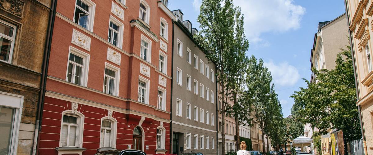 Au-Haidhausen showing cycling and street scenes as well as an individual femail