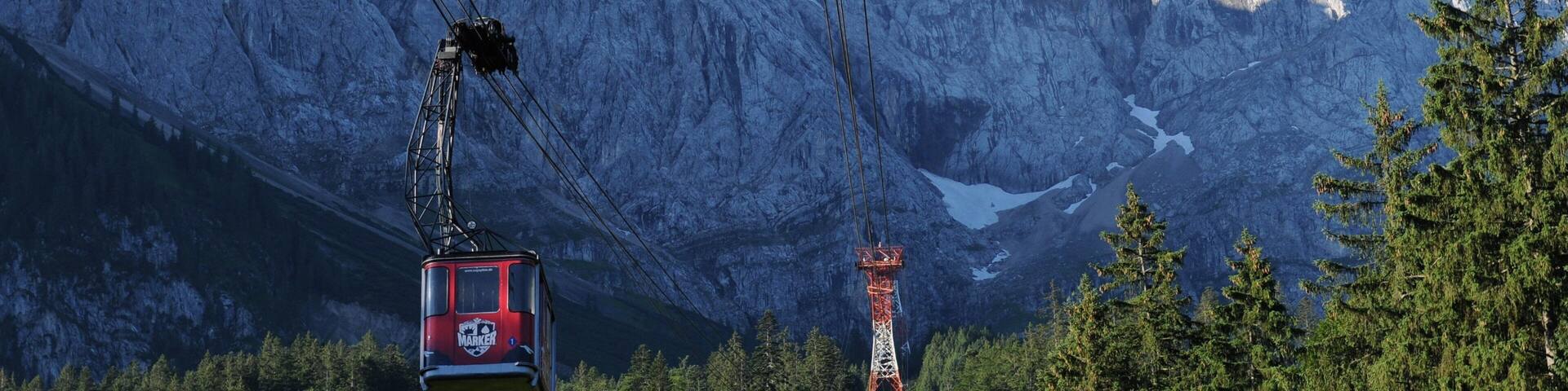 Zugspitze featuring forest scenes, mountains and a gondola