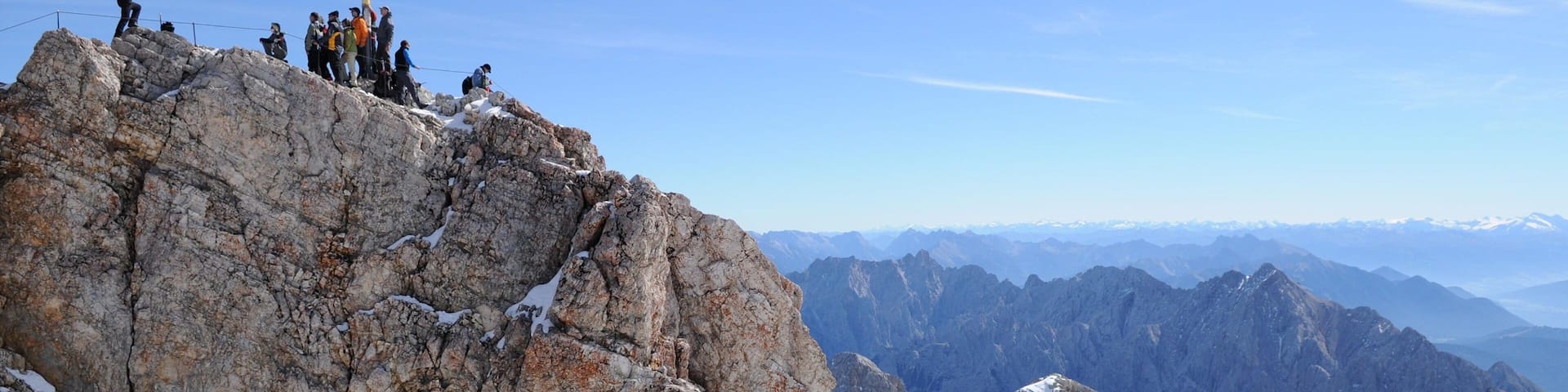 Zugspitze which includes mountains as well as a large group of people