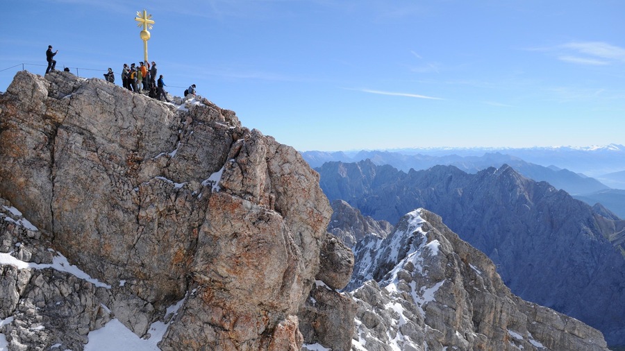 Zugspitze which includes mountains as well as a large group of people