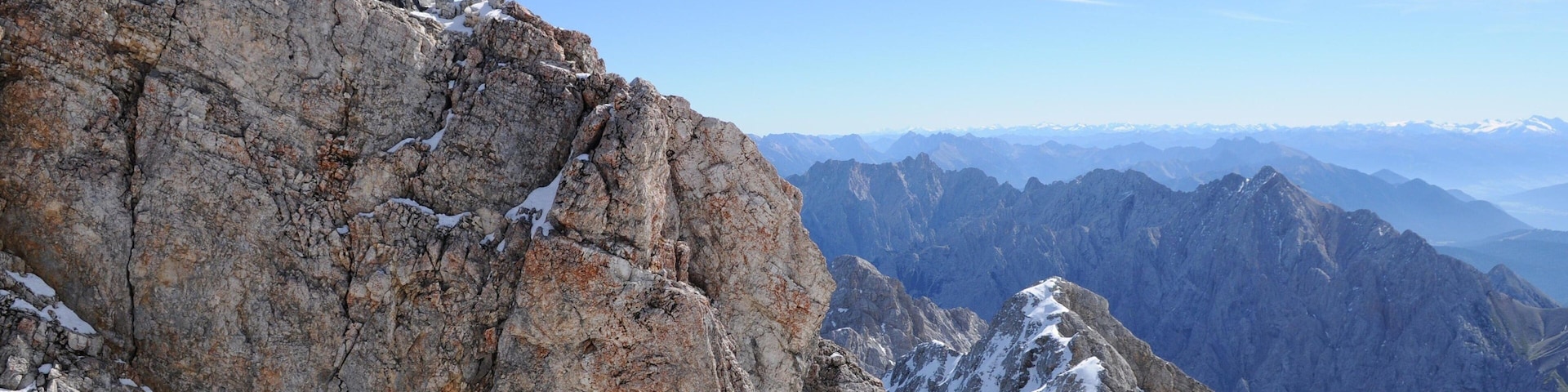 Zugspitze which includes mountains as well as a large group of people