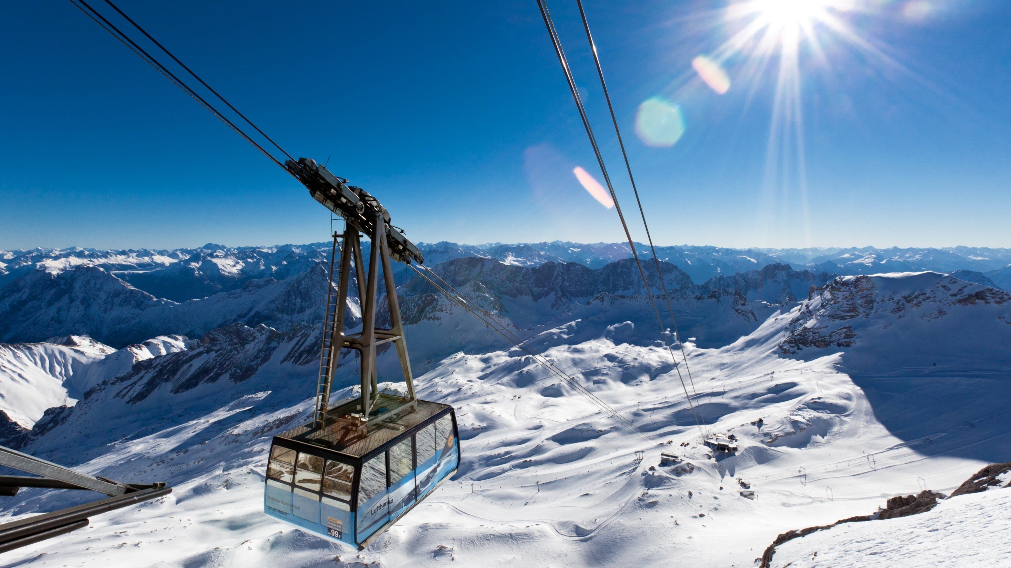 Zugspitze which includes snow, a gondola and mountains