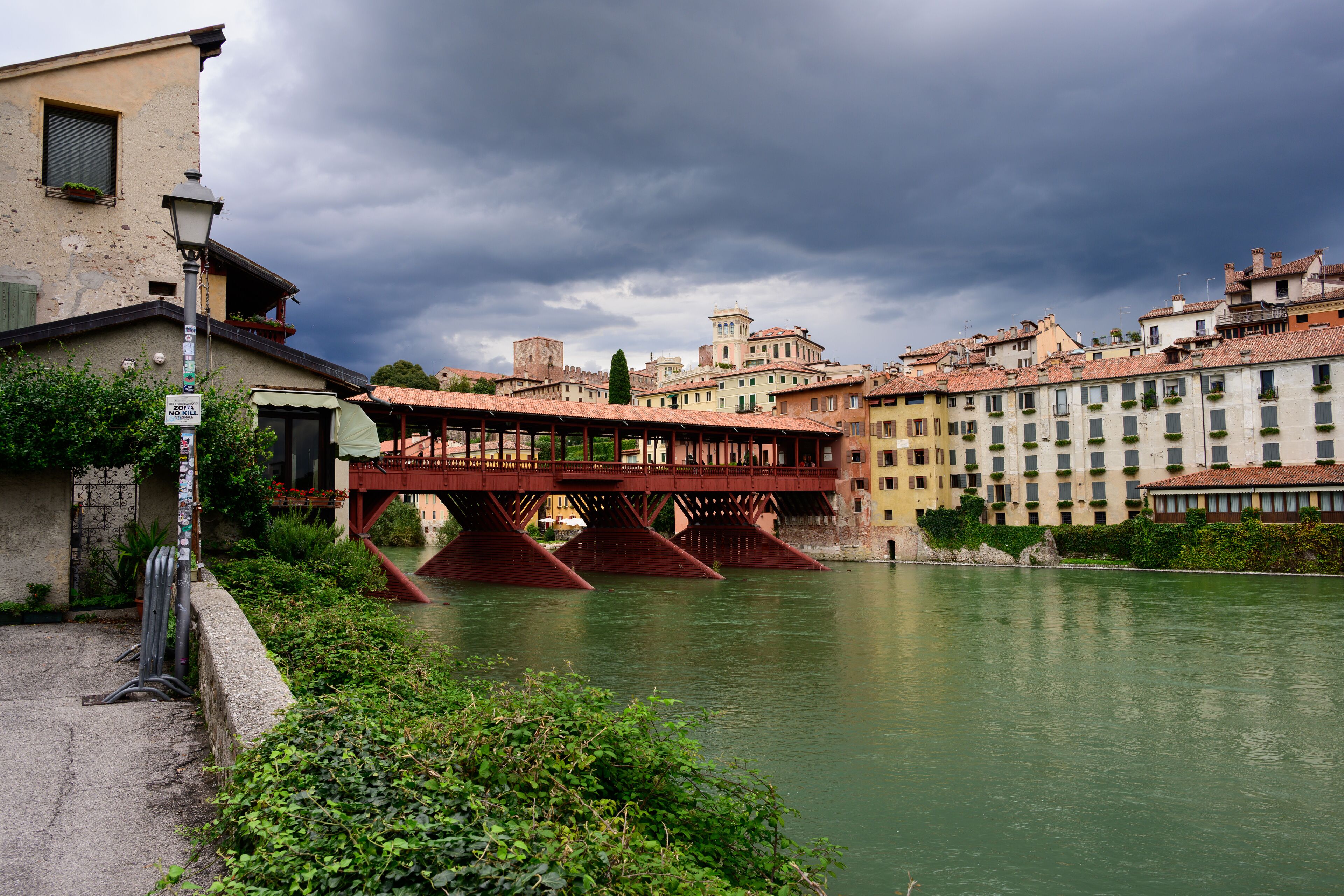 Bassano del Grappa, Italy - September 27 2025: Cityscape with Ponte Vecchio or Ponte degli Alpini Bridge buildt by Andrea Palladio