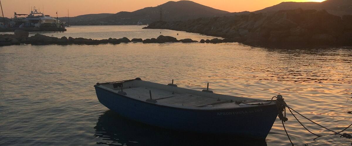 A lovely evening in the Greek island of Paros by the sea x
