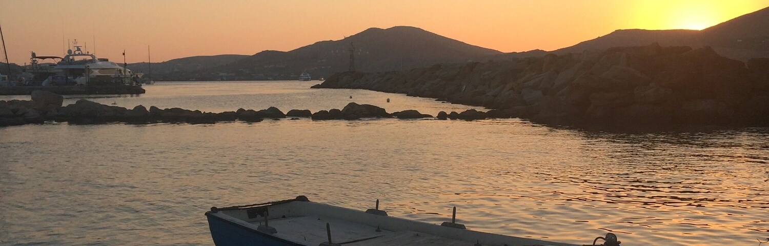 A lovely evening in the Greek island of Paros by the sea x
