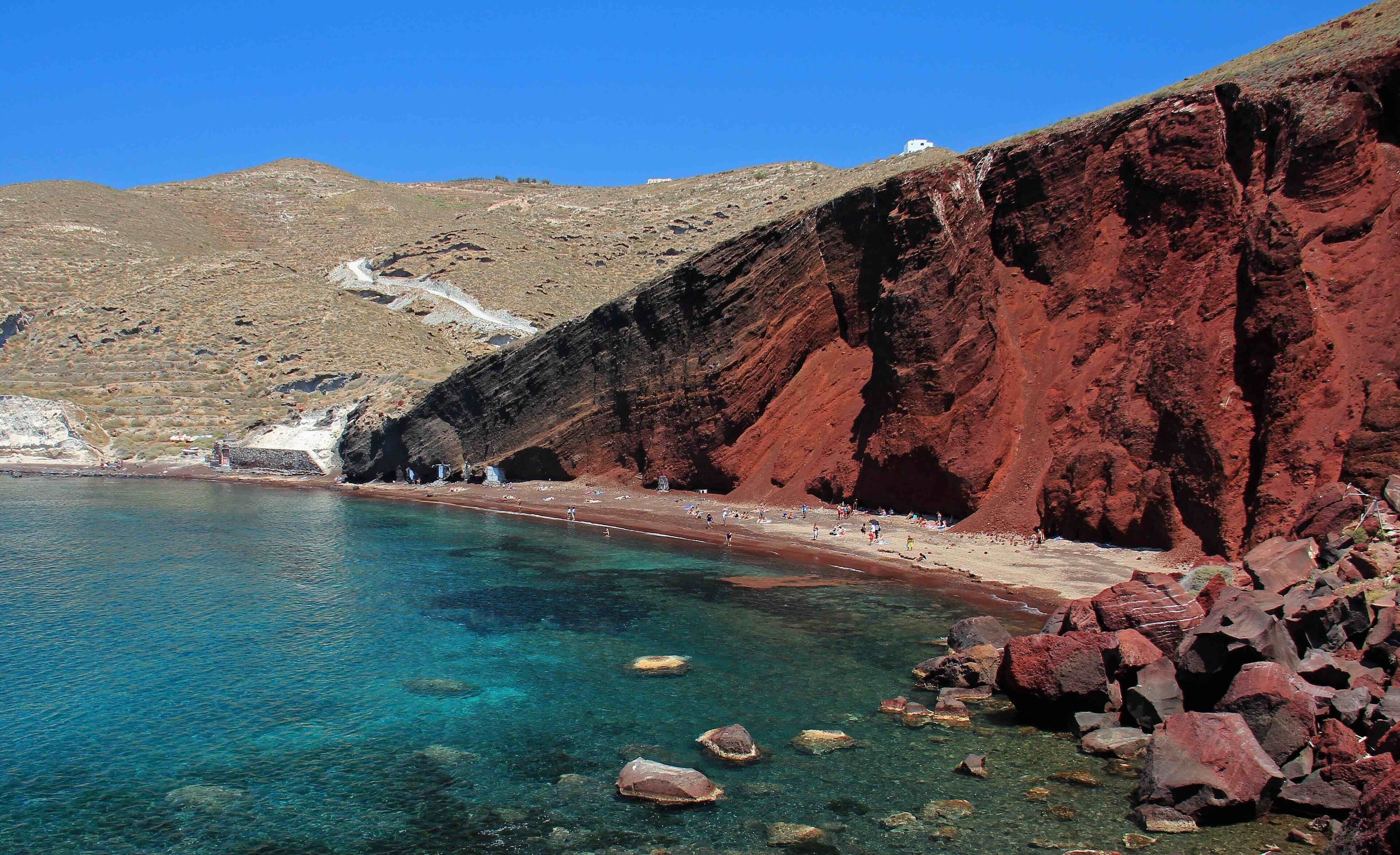 The popular Red Beach on Santorini, Greece. This beach has unique colours compared to the white and black beaches found everywhere else around the island.