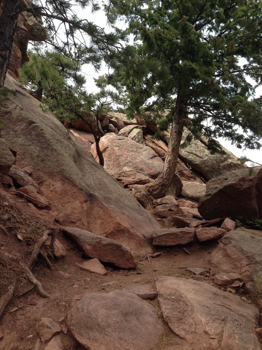 The rocky trail reaches all the way to the top of the flatirons