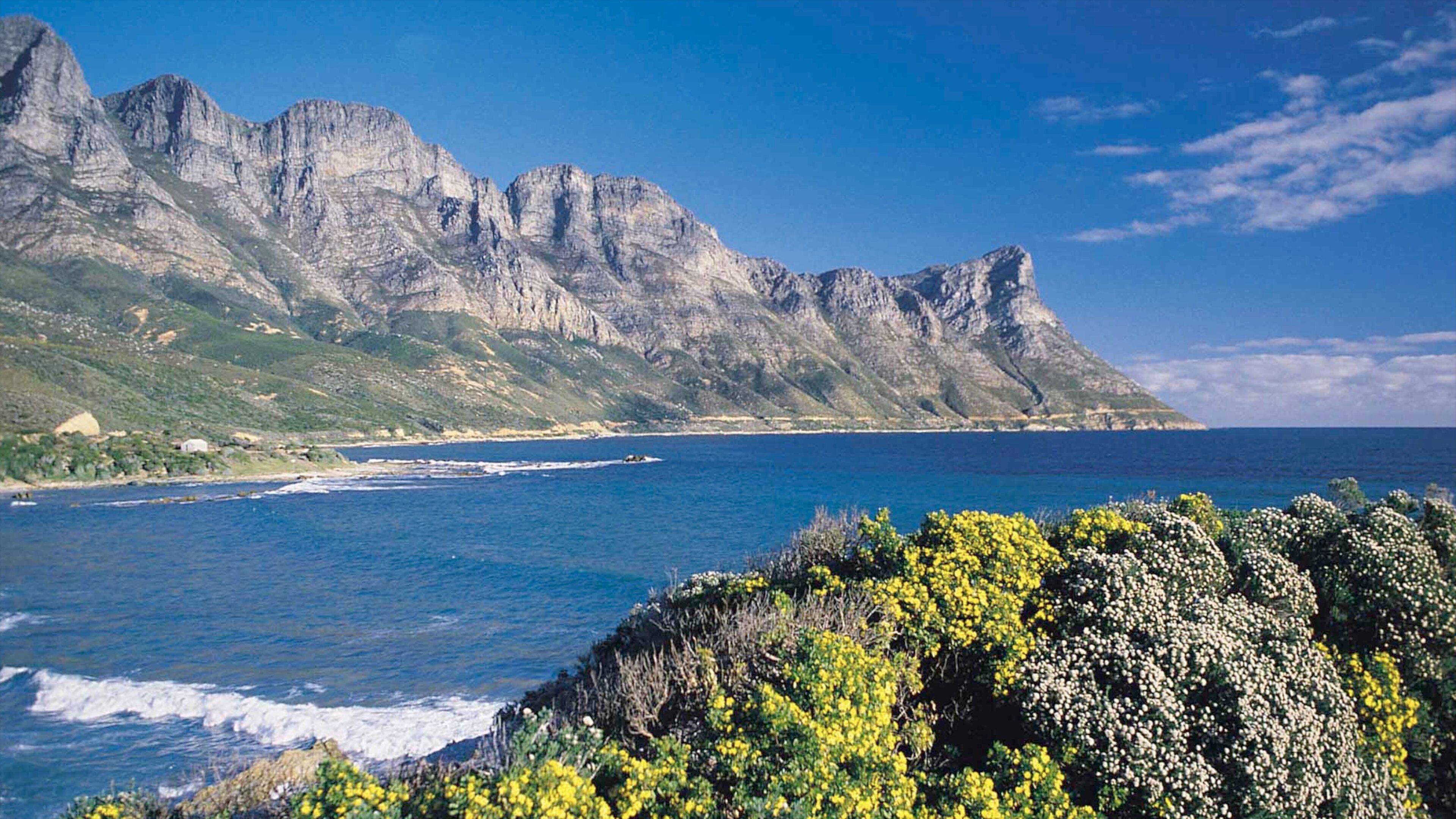 Gordon\'s Bay showing landscape views, mountains and a bay or harbour
