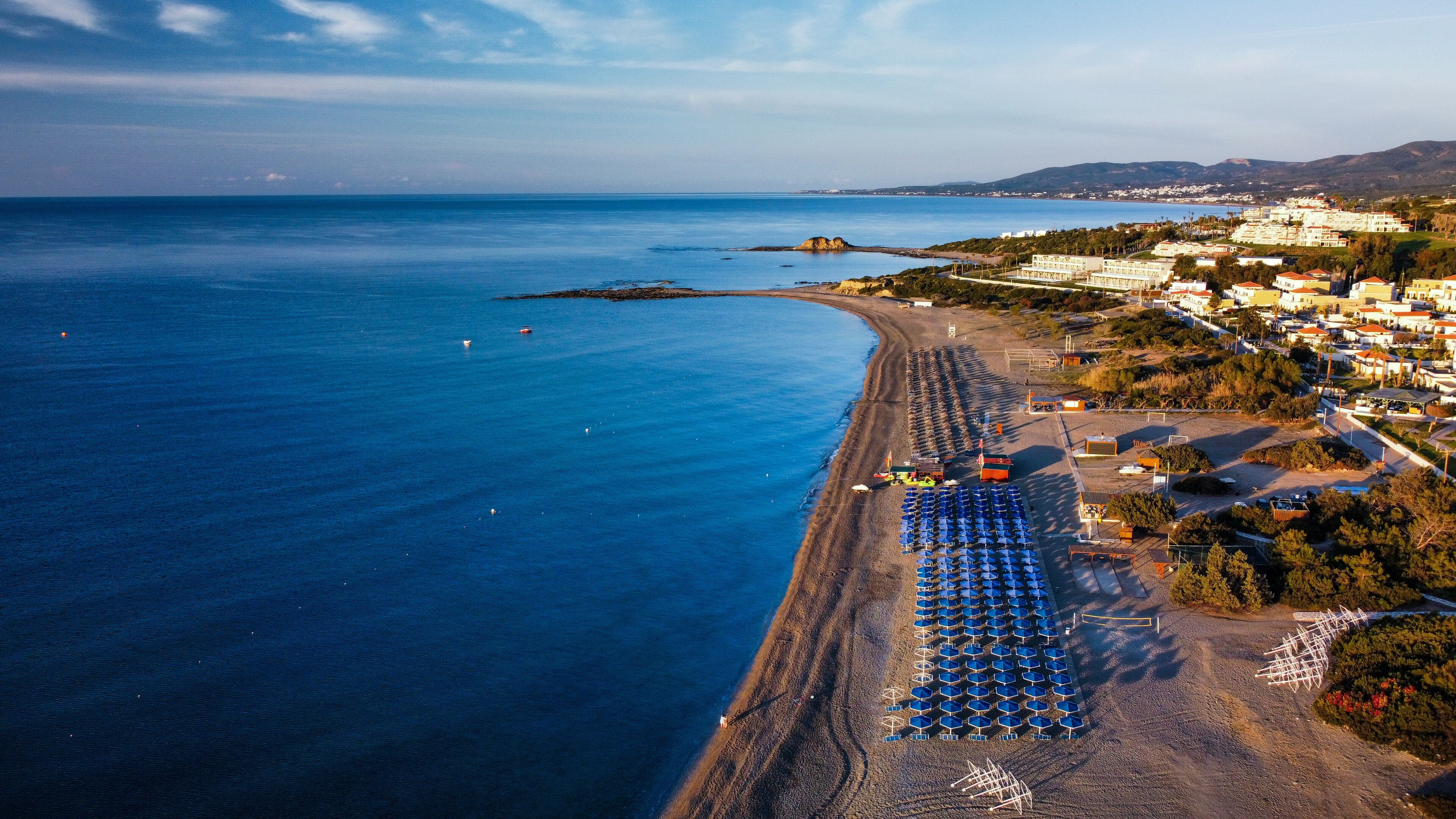 Aerial view of Kiotari beach, Rhodes, Greece in the early morning. HDR azure blue waters. sunrise golden hour