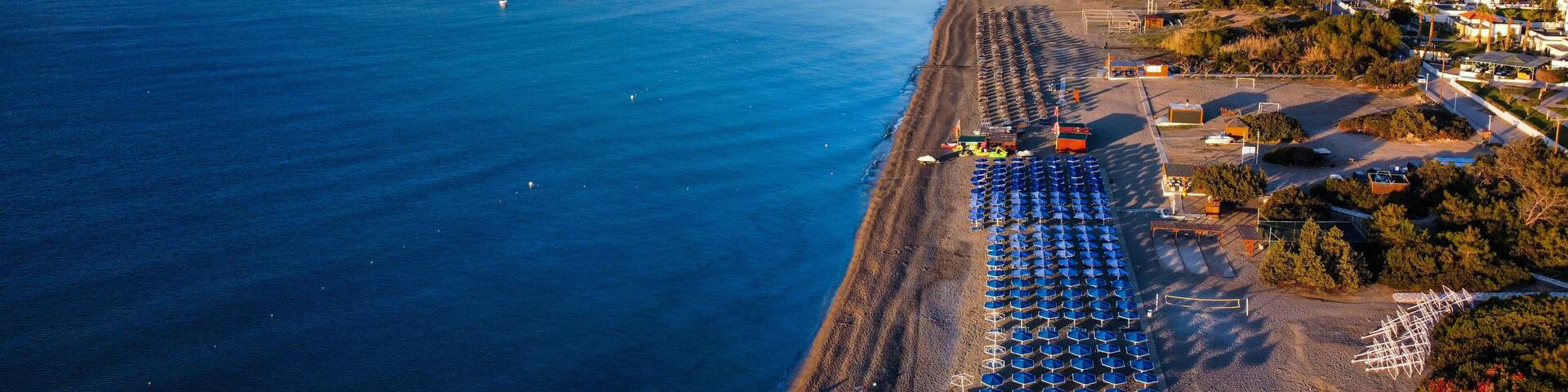 Aerial view of Kiotari beach, Rhodes, Greece in the early morning. HDR azure blue waters. sunrise golden hour