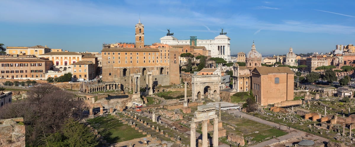 Ancient ruins, including the Colosseum, Roman Forum, and various historical buildings in Rome.