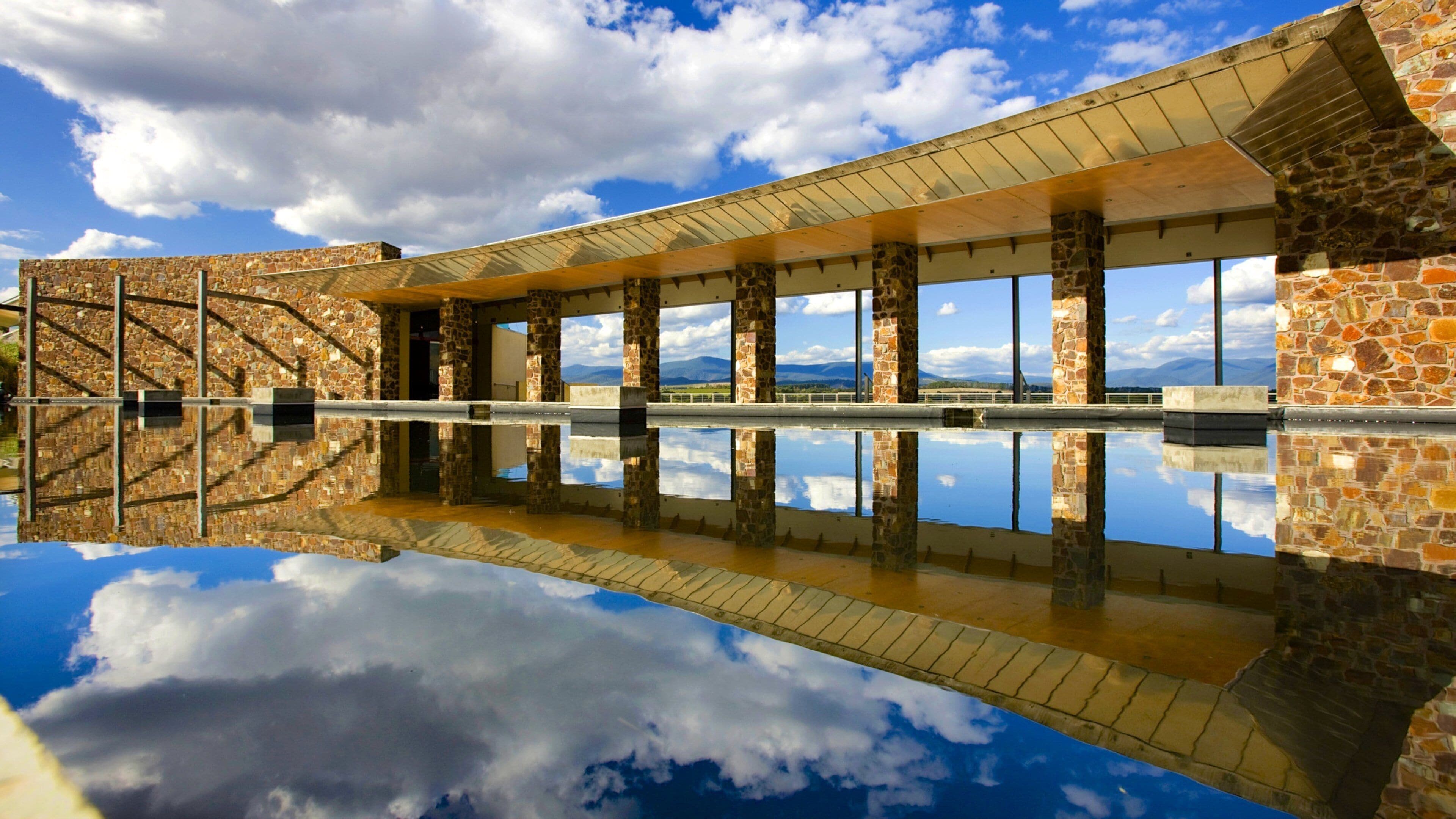 Yarra Valley which includes a lake or waterhole and modern architecture