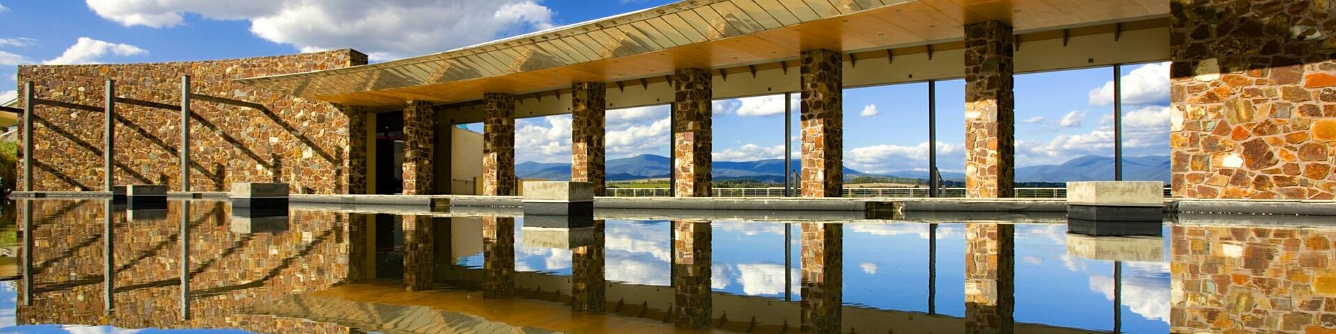 Yarra Valley which includes a lake or waterhole and modern architecture