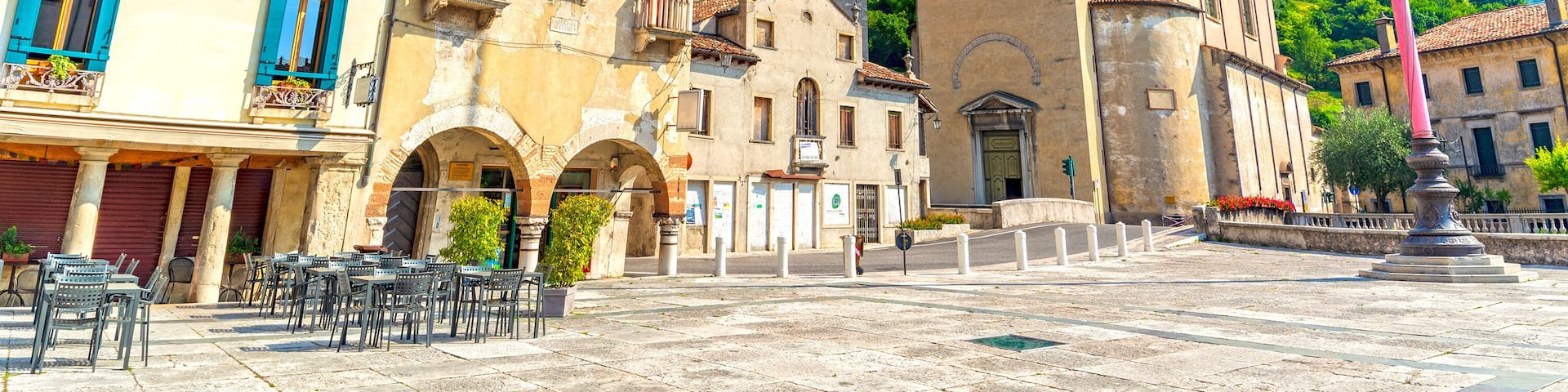 Vittorio Veneto, main square with church tower, town in Treviso province, Italy
