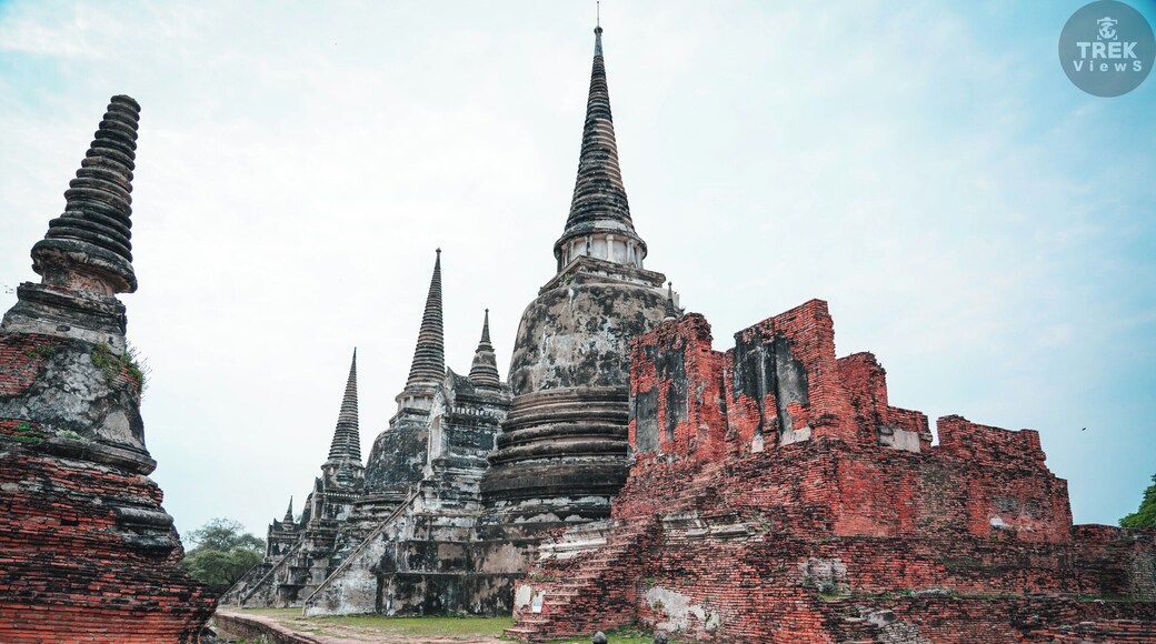 Temple Views | Wat Pra Si Sanphet: One of the most beautiful sites in Ayutthaya and the holiest temple in Thailand’s ancient capital is Wat Pra Si Sanphet, also known as the Temple of the Holy, Splendid Omniscient. Built in 1351, it served as the temple of the royal family and no monks lived there as it was used exclusively for royal ceremonies. The most prominent structures on the site are the three Chedis which were destroyed along with the rest of the temple when the Burmese invaded in 1767. Restoration work begun in 1956, however only the three Chedis were restored. Without a doubt being built for a King, nothing was spared when it came to the beauty of this temple complex. By all means if you make it to Ayutthaya don’t miss visiting this temple, it’s absolutely wonderful!
.
.
.
.
#sonyalpha #sonya7riii #traveler #travellife #travelphotography #travelpics #travelgram #wanderer #wanderlust #instagood #instatravel #troveon #yourshotphotographer #lpfanphoto #travelsoutheastasia #travelthailand #southeastasia #thailand #visitthailand #beautifulseasia #igthailand #thailandinsider #amzthld #vscothailand #ayutthaya #ancientcity #ruins #temple #buddhism #chedi
