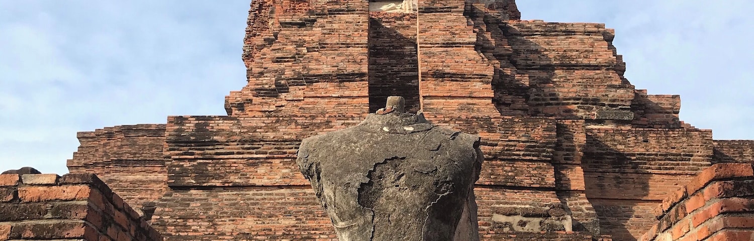 Wat Phra Ram's tall main prang (Khmer-style spire) isn't in the best condition, but it's definitely worth a visit. The temple was constructed on the cremation site of King U Thong (the Ayuthaya kingdom's first sovereign), perhaps in 1369, though details are unclear. Despite being next to Wat Phra Si Sanphet, But this place attracts tourists. #WatPhraRam #Ayutthaya #Thailand #History