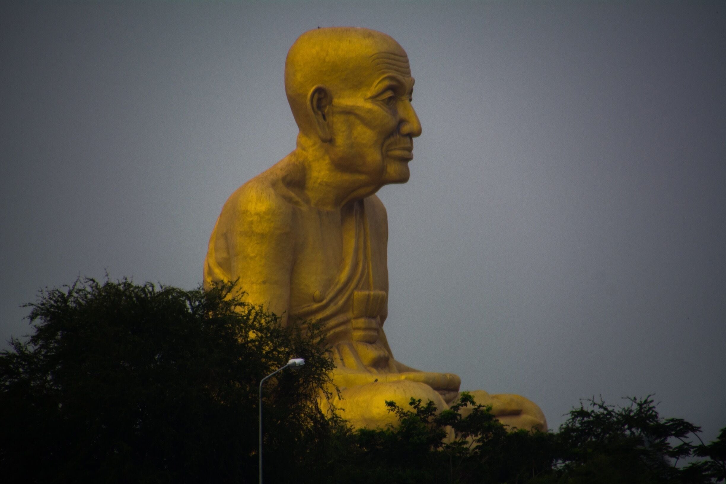 Enormous sculpture of a monk on the way to Chang Mai. 