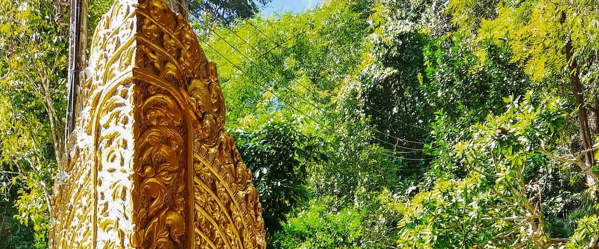 The journey begins with a single step. The foot of the staircase that will take you to the summit of Wat Tham Pha Plong and one of its guardians. 
As you walk the 510 steps, be certain to be mindful. Read all the meditative statements and take a moment to reflect on the words. 
When I returned to the bottom after visiting this amazing mountain jungle temple I felt as light as air!
#Trovember #Thailand #ChiangDao
#solotravel #hiddengem