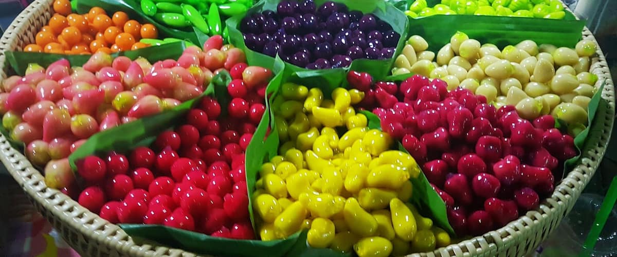 Look Choop - Thai Candy made from Smashed and sweetened mung bean paste made into cute candies to look like fruit and glazed in sweet candy. #LifeAtExpedia