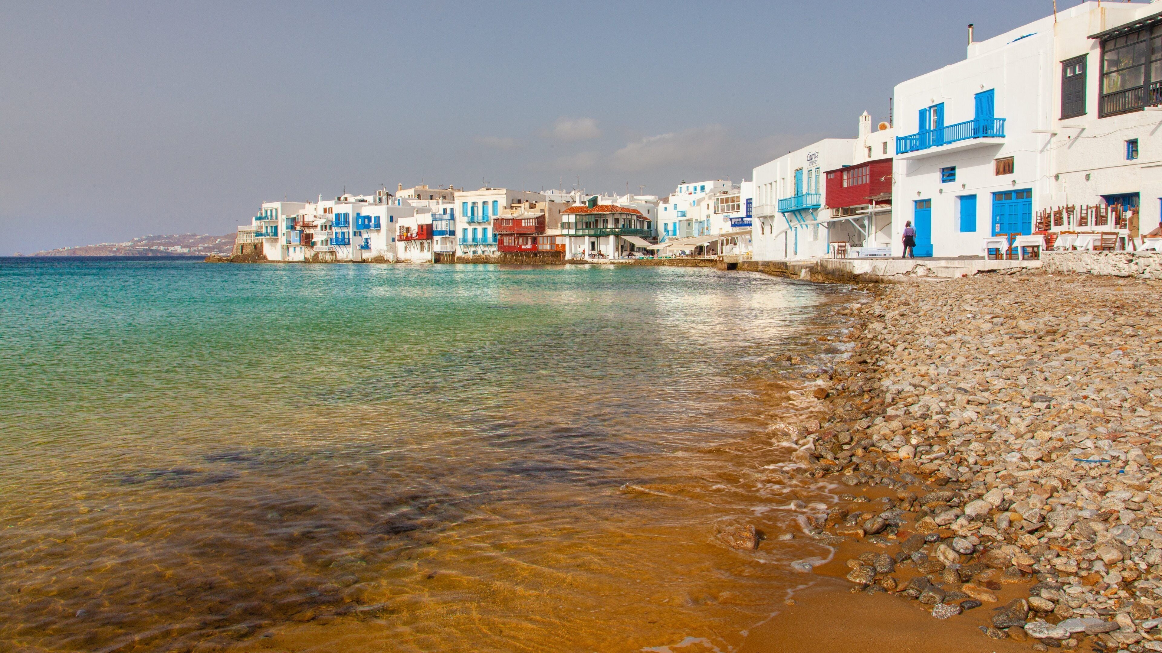Mykonos Town showing a pebble beach, general coastal views and a coastal town