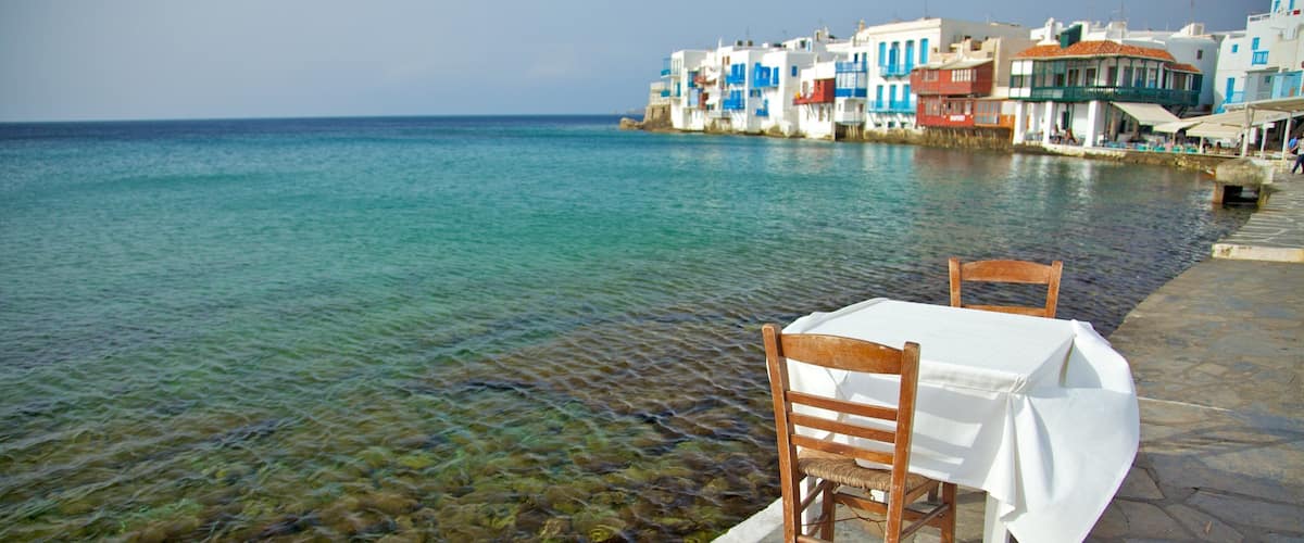 Mykonos Town showing general coastal views, heritage architecture and a coastal town