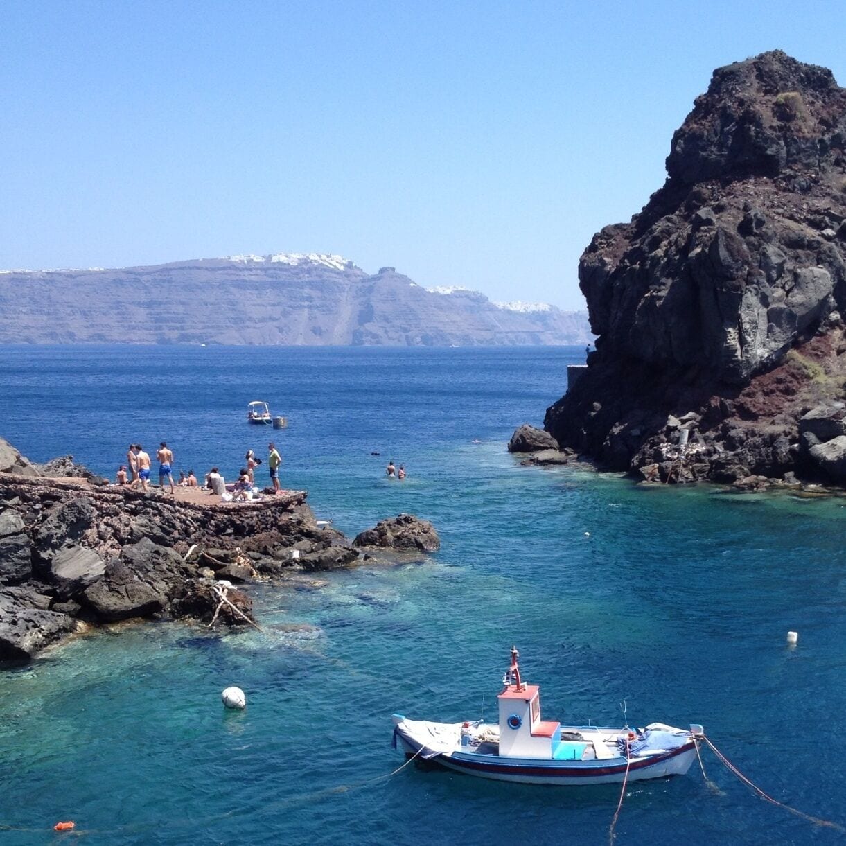 Take the dirt path from the port south. It's about a 5 minute walk and you'll find this great spot to swim. You can swim to the island of Nikolaos, on the back side is a church and a platform for cliff diving. 