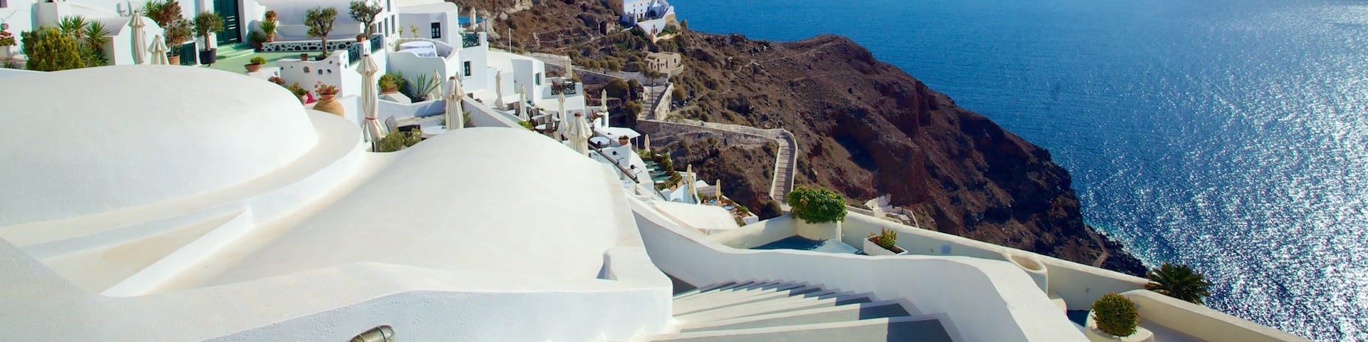 Oia ofreciendo vistas de paisajes, vistas generales de la costa y una ciudad costera