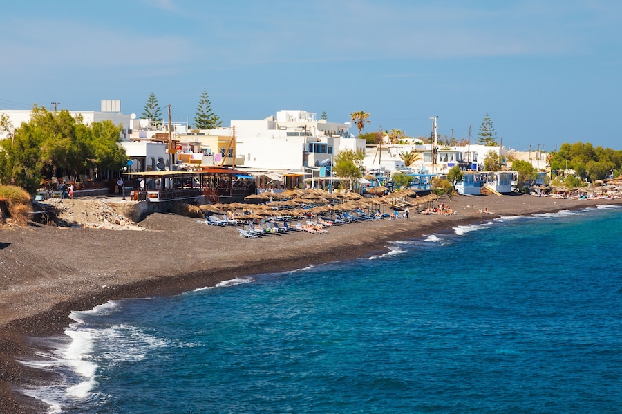 The black volcanic beach at Kamari Santorini Greece