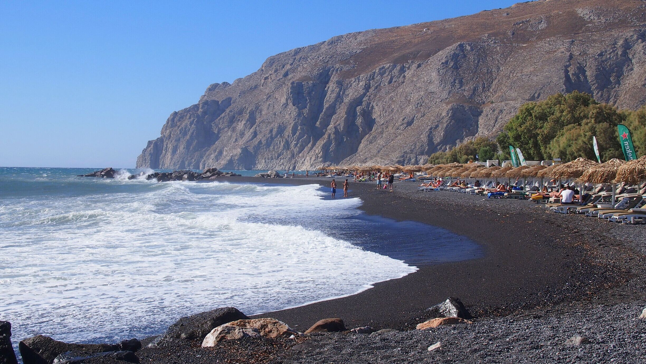 Black pebble beach in Santorini, Greece.