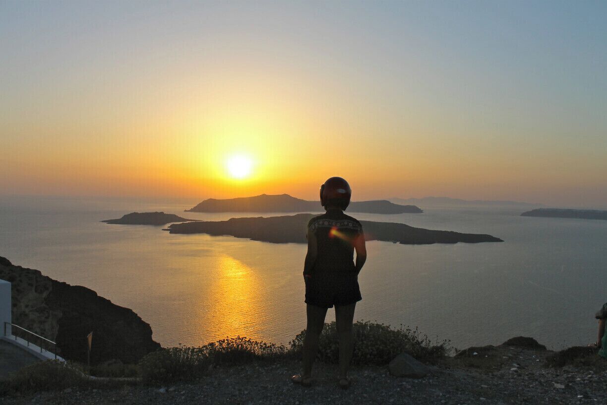 While many people flock to Oia to take in the Santorini sunset, we rented an ATV and took a road trip around the island during the golden hour. The sunset was spectacular at every stop of our journey. This one pierced my heart :) #TroverDetour #santorini #island #travel #sunset #greece