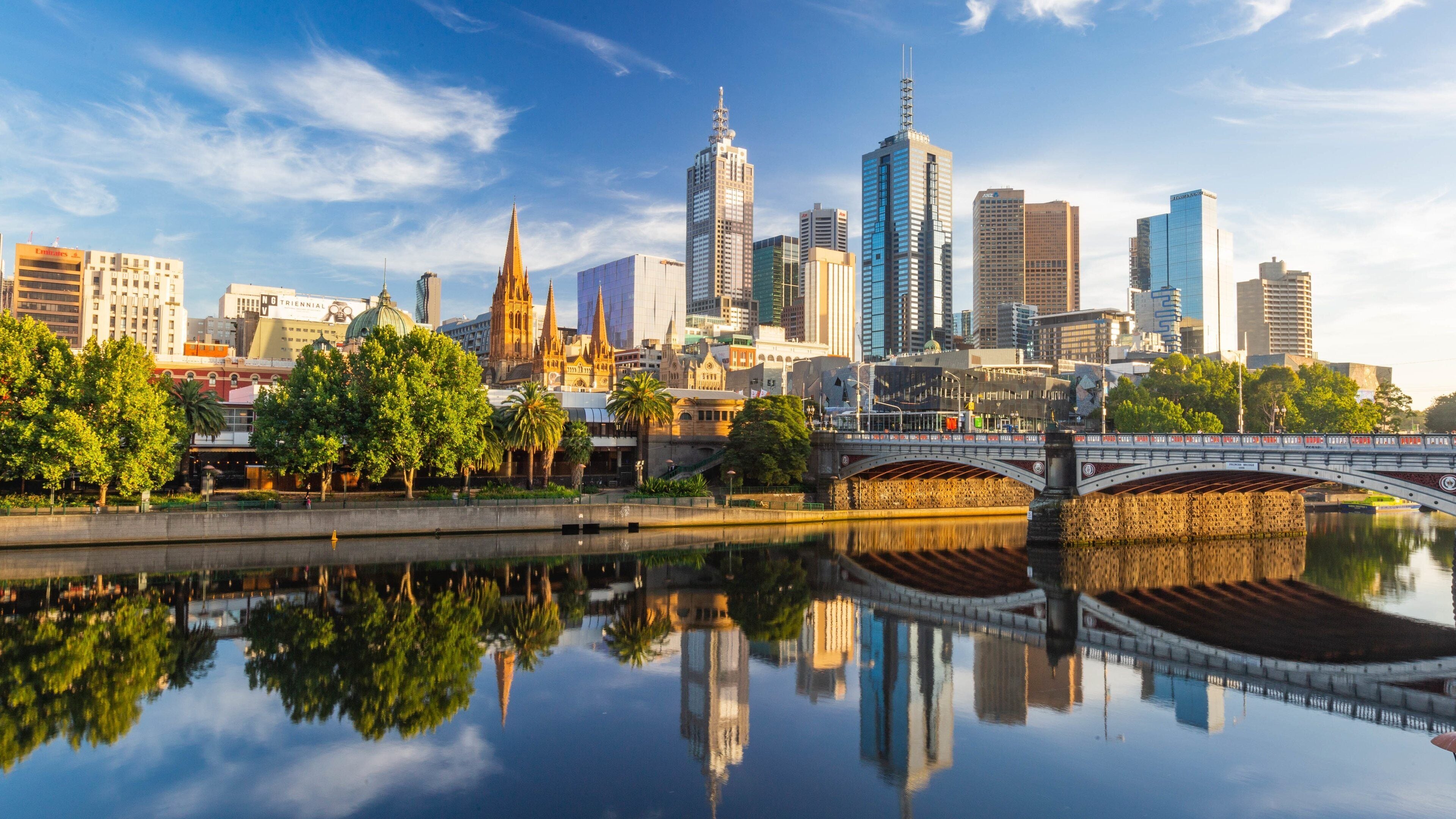 Melbourne Central Business District showing a sunset, a city and a bridge