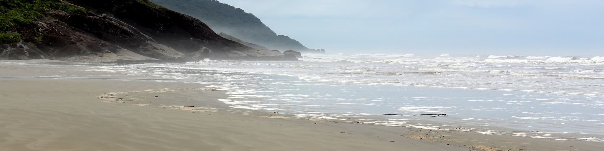 Cloudy day landscape at the beach of Barra do Una, located at Juréia-Itatins Ecological Station, Peruíbe, São Paulo, Brazil.