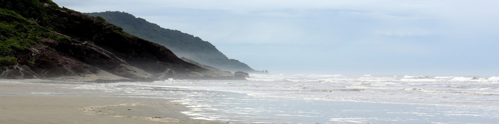 Cloudy day landscape at the beach of Barra do Una, located at Juréia-Itatins Ecological Station, Peruíbe, São Paulo, Brazil.