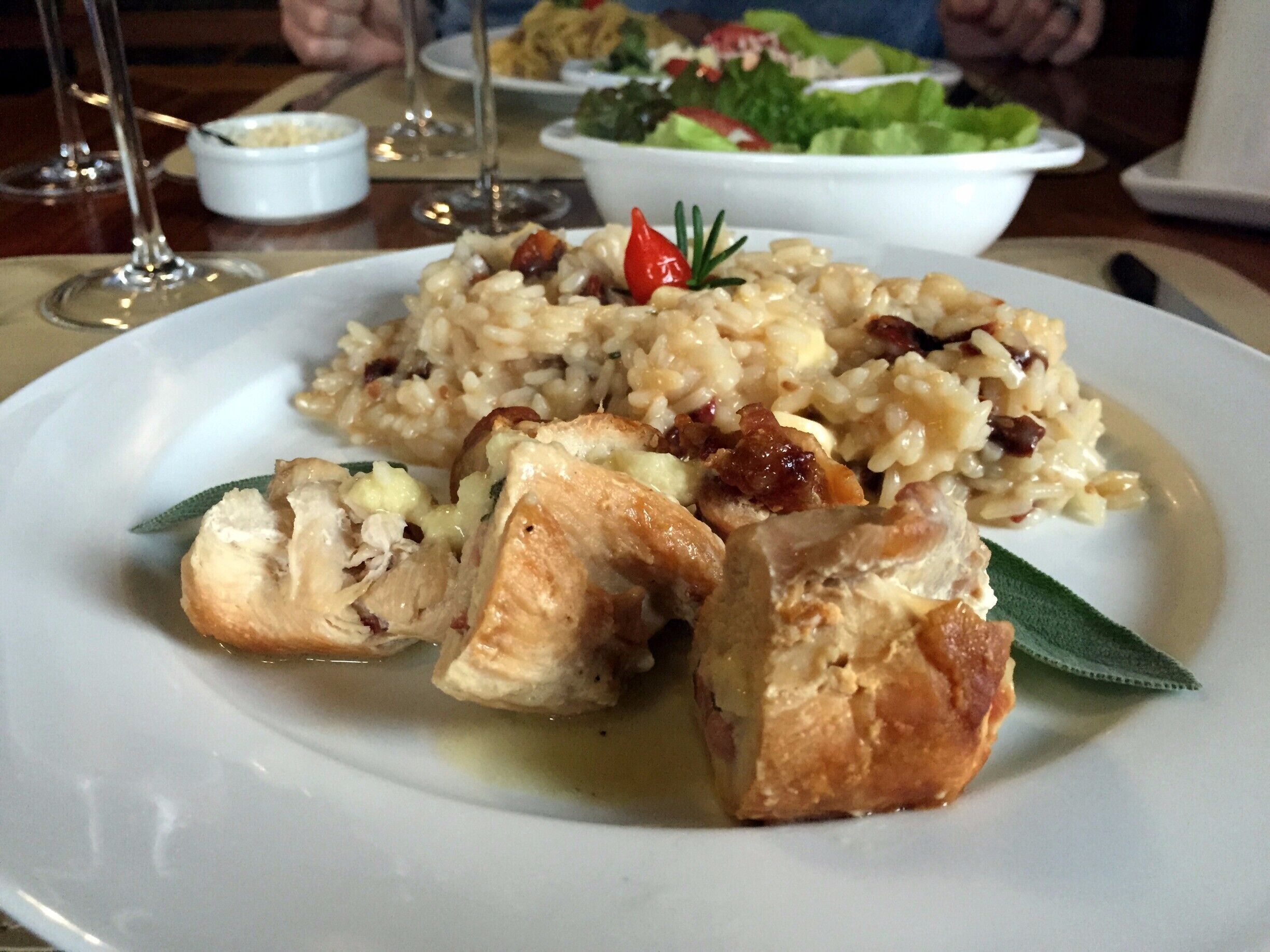 One of my favorite experiences during our Bento Goncalves trip was stumbling upon Casa Postal Vinicola and Bistro. It was a rainy Sunday, after visiting nearby Salton, and didn't know what to do. We saw signs for Casa Postal so headed that way. We were the only people in the place when we came in from the rain, which may have thrown some people off but for us made it feel like an adventure. The woman working the winery (and the bistro!) didn't speak English and we speak very poor Portuguese but we managed to communicate with each other using Google translate. She led us through a tasting of their wines, before cooking us an amazing lunch (pictured) in the bistro upstairs. This is a newer place in the area, which explains the lack of other patrons, but I doubt it will stay empty for very long. The wines and food were very good and the service above and beyond.