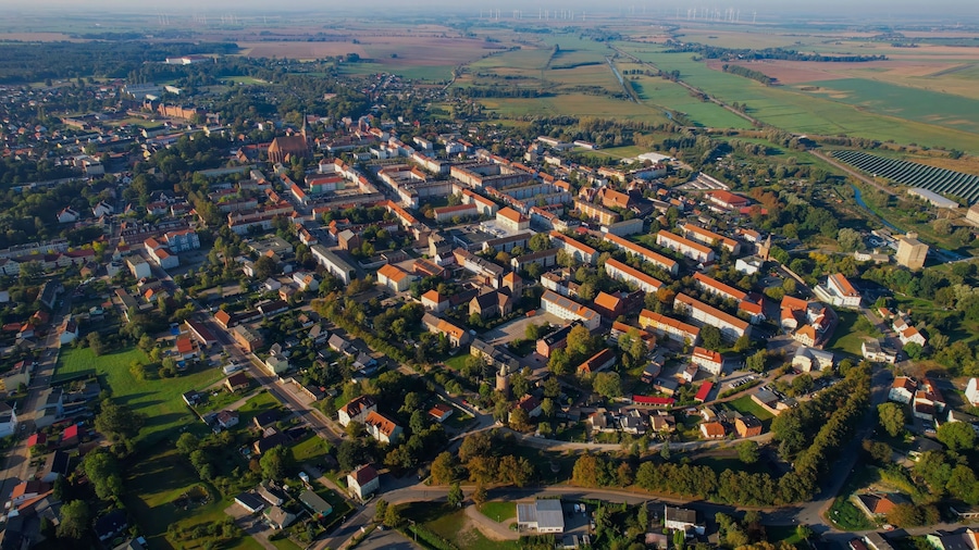 Aerial panoramic view around the old town of the city Pasewalk on a sunny morning in summer in Germany.