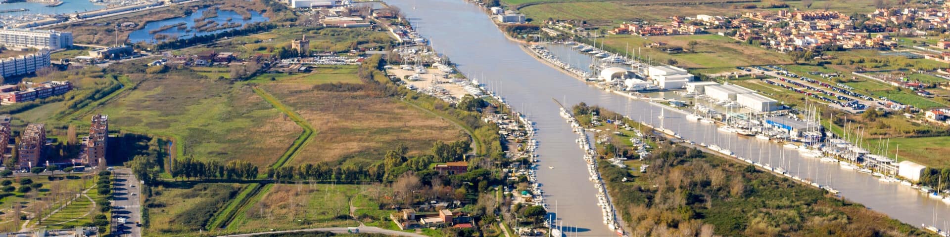 Aerial view of the Tiber River estuary in the Tyrrhenian Sea. It is located in the municipality of Fiumicino near Rome, Italy.