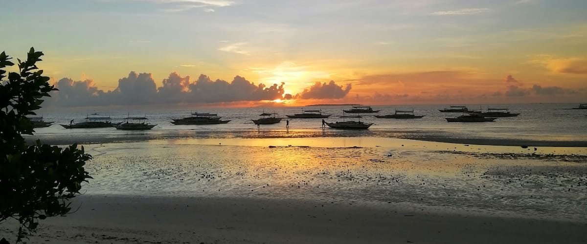 Perks of being an earlybird during my birthday trip to Bohol, Panglao Philippines, last December 2019. What a calming view to start a day. Sunrise is love and the tide is low. Ocean breeze is hugging. <3