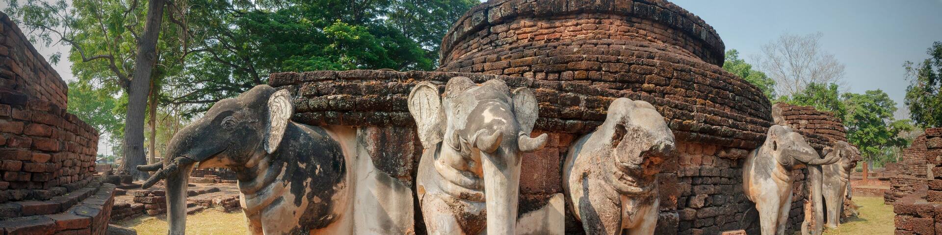 Ancient elephant sculpture at Wat Phra kaeo temple in Kamphaeng Phet Historical Park (a part of the UNESCO World Heritage Site Historic Town of Sukhothai and Associated Historic Towns) , Thailand