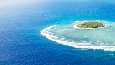 Panoramic aerial view of Tavarua, heart shaped island, Mamanucas, Fiji