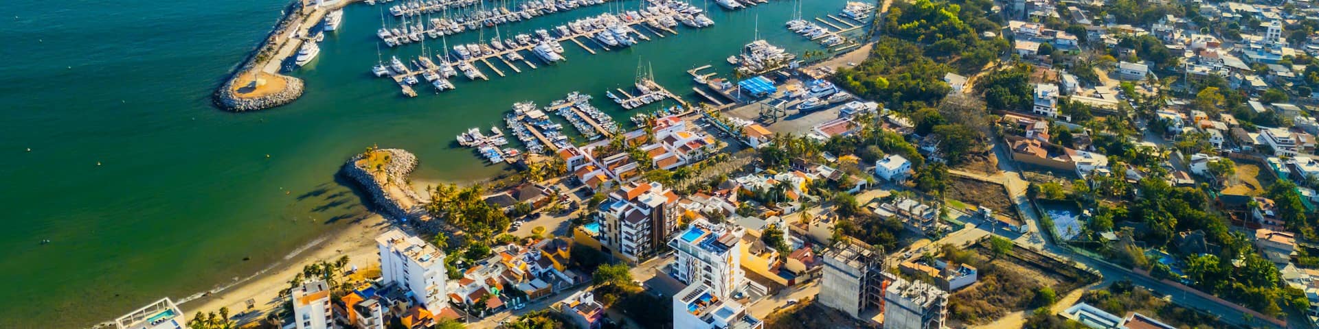 La Cruz de Huanacaxtle marina and beach embracing the pacific ocean in Nayarit, Mexico