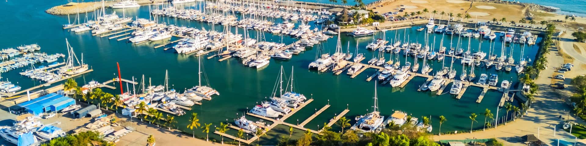 Marina at La Cruz de Huanacaxtle crowded with yachts on a sunny day in Nayarit, Mexico