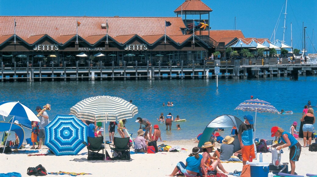 Hillarys which includes a sandy beach as well as a large group of people